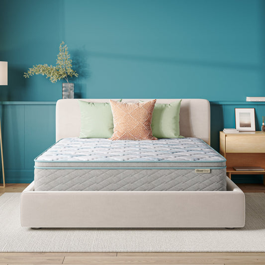 Beautysleep Mattress in a grey bedframe with 3 pillows on top of it within a bedroom setting