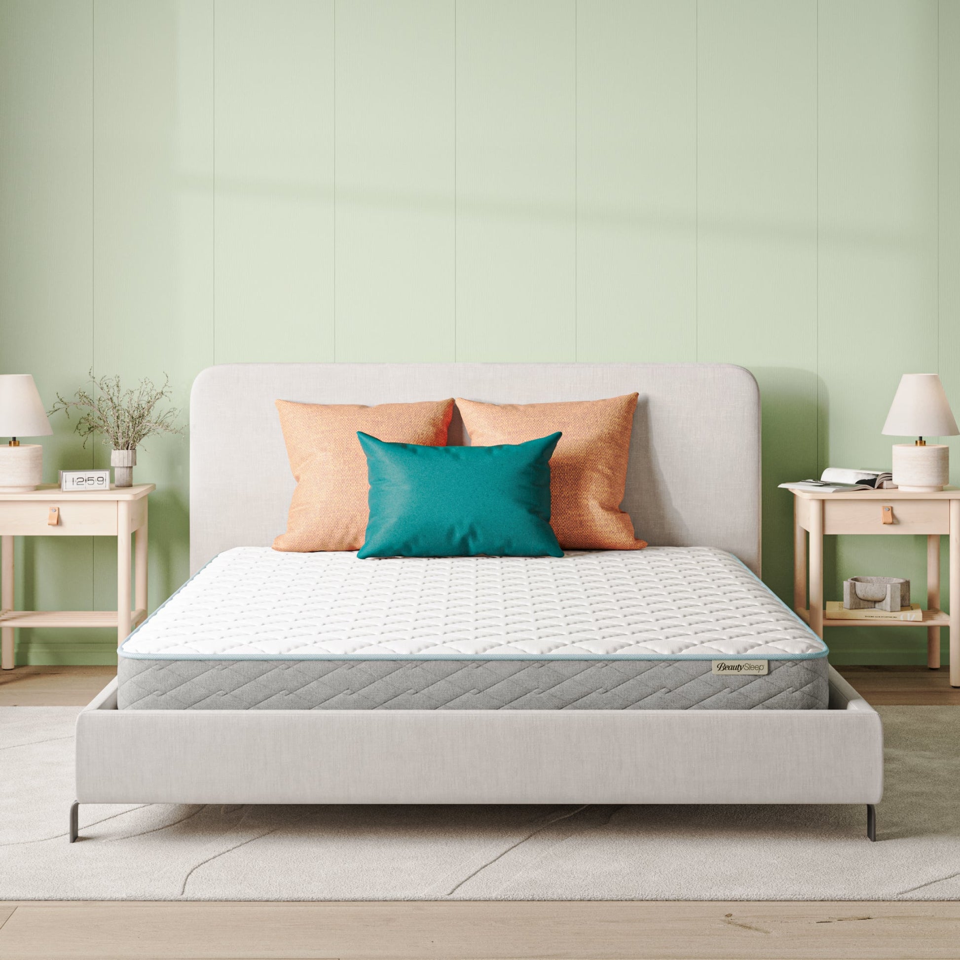 Beautysleep Mattress in a grey bedframe with 3 pillows on top of it within a bedroom setting