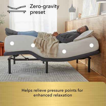 Man laying asleep on a white mattress sitting on a Baselogic Gold Adjustable Base || level: Gold